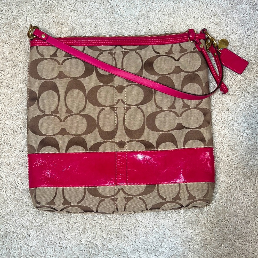 Pink and brown coach purse. I never used it after getting it.